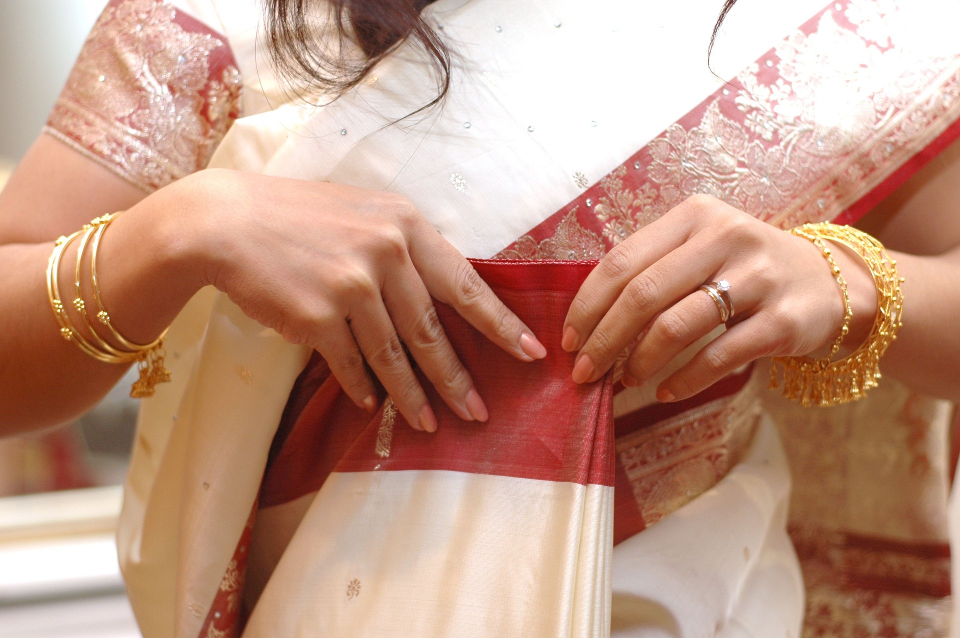 Holding her sari